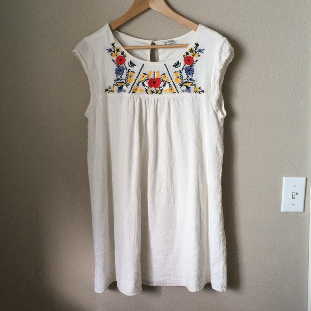 White embroidered dress from Roolee